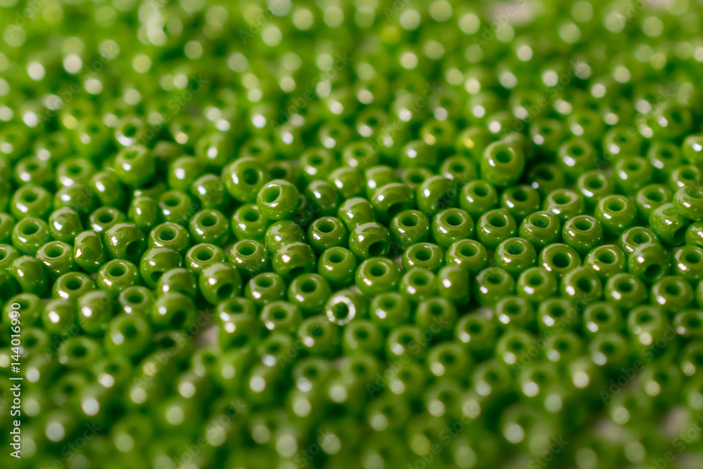 Heaps of green glass beads