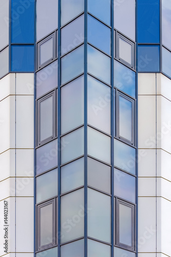 background texture. glass facade of a modern high-rise building