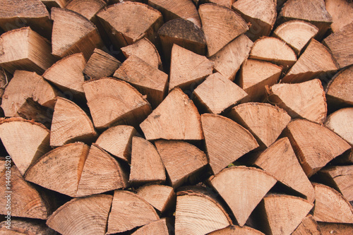 Pile of split firewood of various types of wood