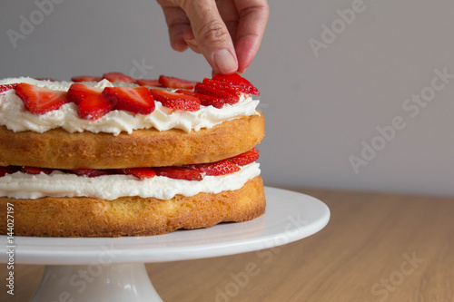 Victoria Sponge Cake with Whipped Cream and Strawberry