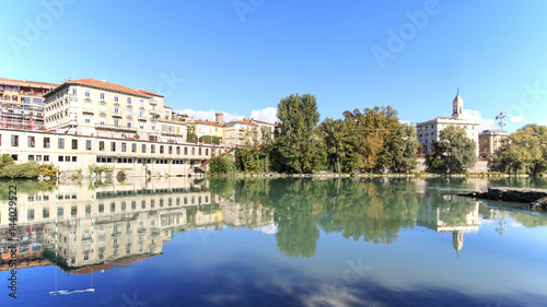 Dora Baltea River and Ivrea cityscape in Piedmont, Italy