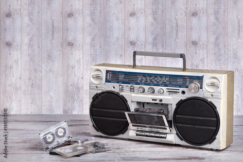 Retro radio-cassette player.Dusty old cassettes.Vintage style .