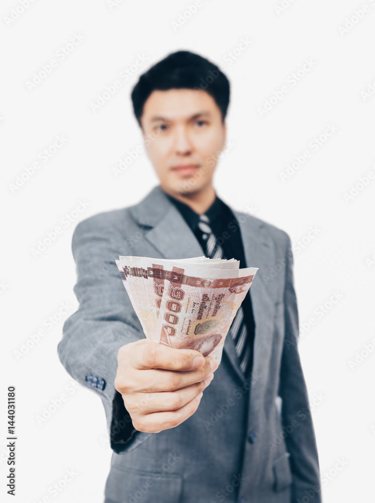asian handsome businessman in suit showing banknotes, isolated on white asian handsome businessman in suit showing banknotes, isolated on white