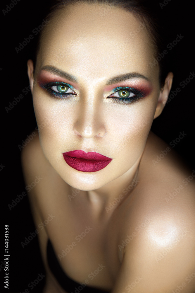 Beautiful woman portrait with glamour make up on black background. Beautiful woman portrait with glamour make up on black background.