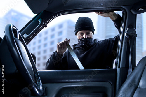 Принти на полотні male robber car theft break in daytime