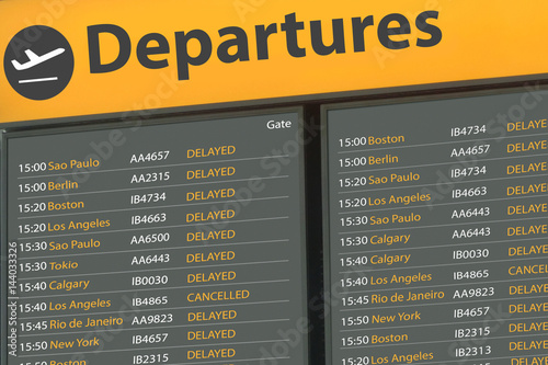 Airport Departure Board with delayed flights 