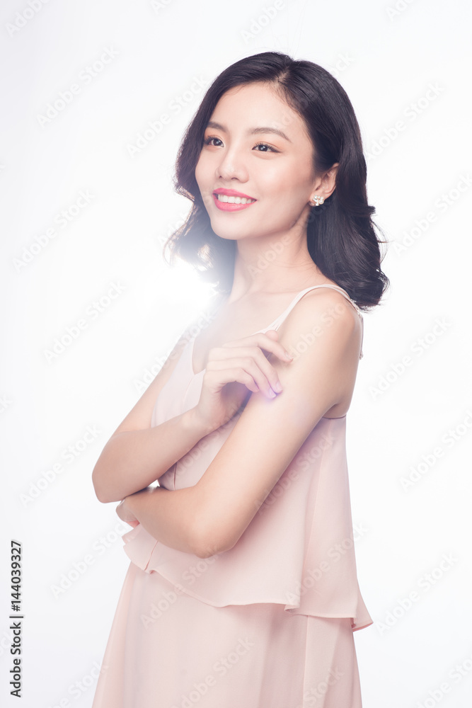 Glamour portrait of beautiful ASIAN woman model with nice makeup and romantic wavy hairstyle. Glamour portrait of beautiful ASIAN woman model with nice makeup and romantic wavy hairstyle.