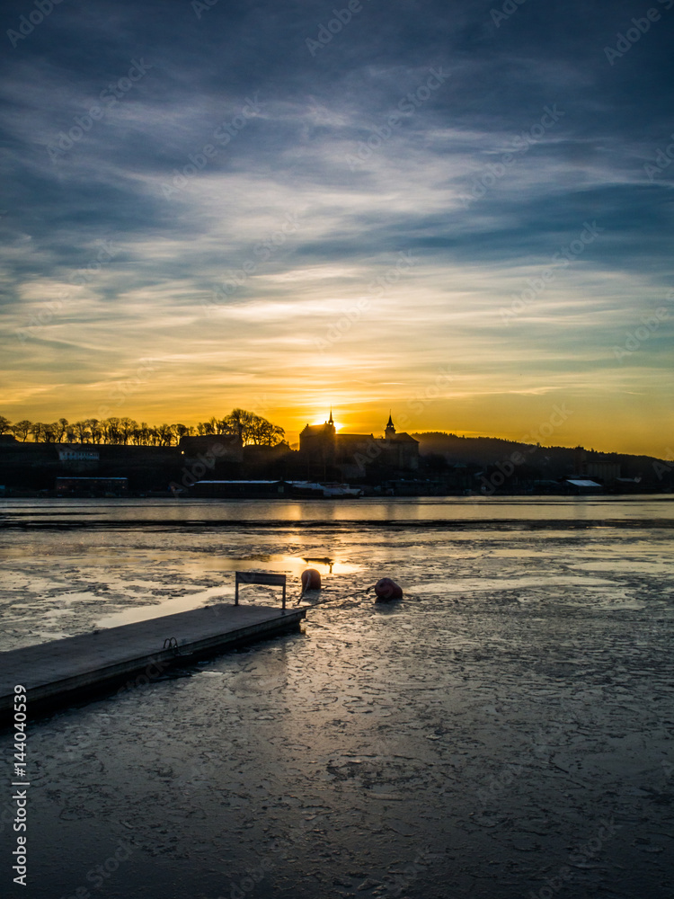 A beautiful sunset over the frozen water
