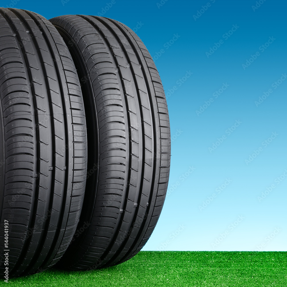 Summer car tyres on grass