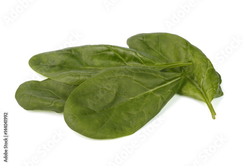 Spinach leaves on white isolated background closeup