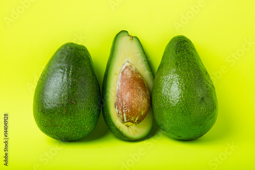 avocado on yellow background