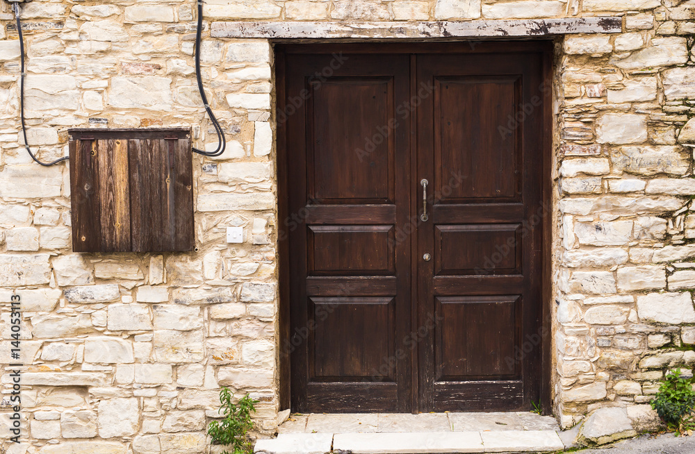 Wooden front door of a home Wooden front door of a home