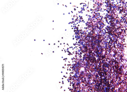 Purple glitter sparkles on white background. Can be used as place for text  for greeting or invitation cards  fashion magazines  web sites etc.