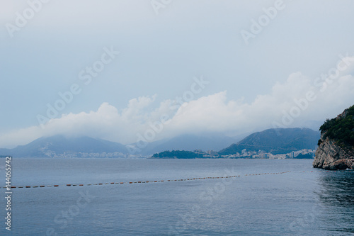 Budva Riviera in Montenegro at night. Sea coast and the mountains