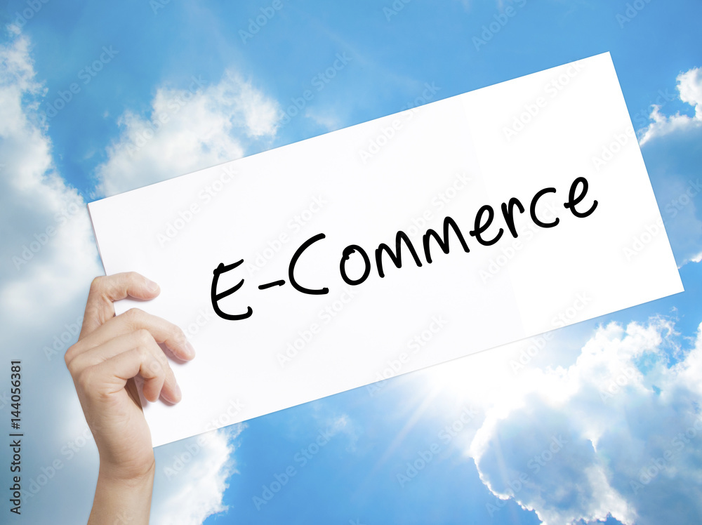 E Comerce Sign In E-Commerce Sign on white paper. Man Hand Holding Paper with text ...