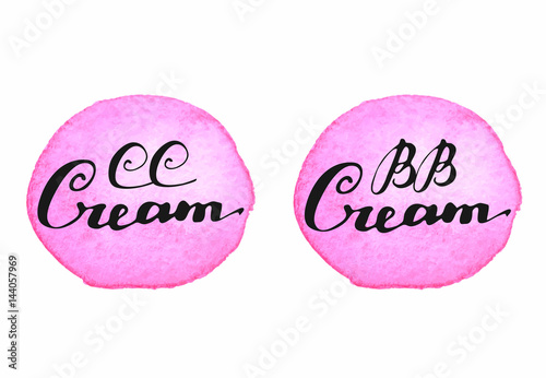 Hand written words BB Cream and CC Cream on pink watercolor splashes on white background