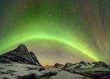 Aurora borealis (Polar lights). View to Steinfjord on Senja island - Lofoten islands, Norway