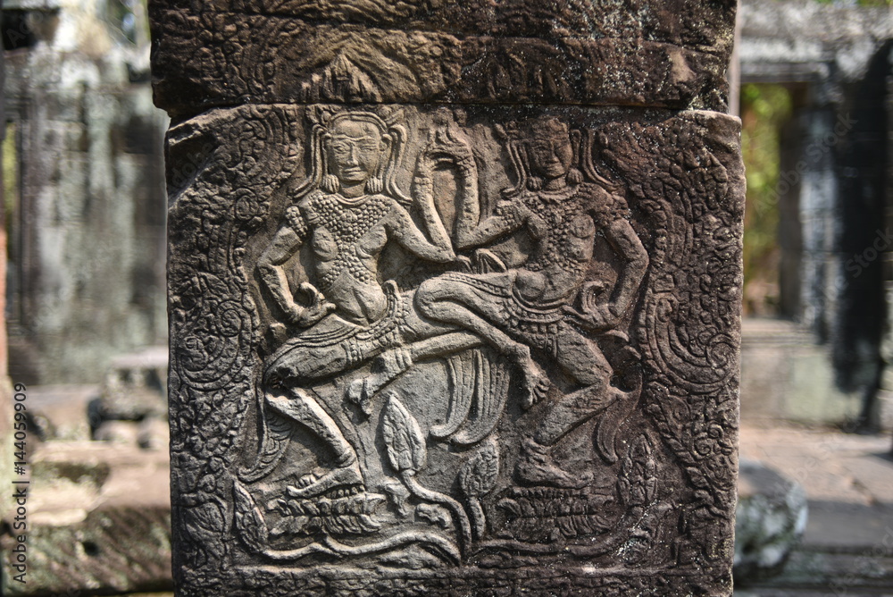 Sculptures of apsara dancers on temple, Angkor Wat Cambodia.