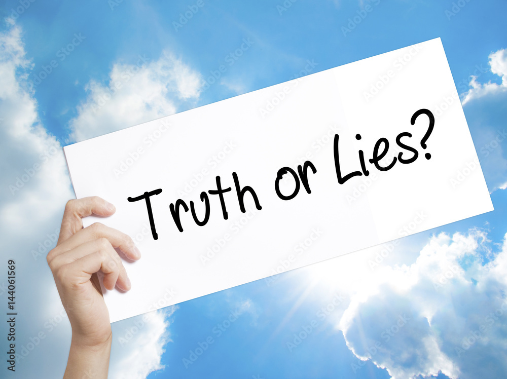 Truth or Lies? Sign on white paper. Man Hand Holding Paper with text. Isolated on sky background Truth or Lies? Sign on white paper. Man Hand Holding Paper with text. Isolated on sky background