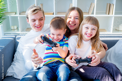 Family playing video games photo