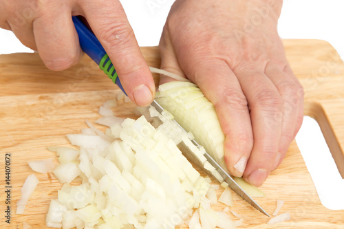 cook onion cut on a board on a white background