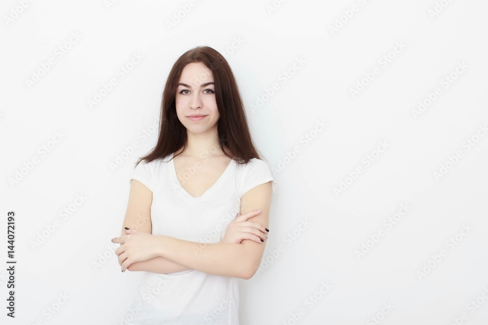 Young casual woman In pink blouse isolated over white background studio portrait Young casual woman In pink blouse isolated over white background studio portrait