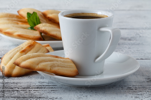 madeleine french pastry on plate on white background