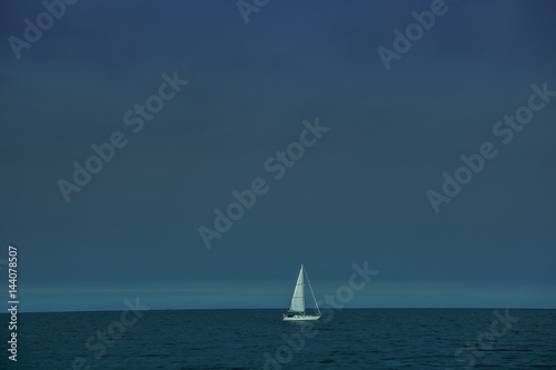 Lonely ship in the sea. The ship in sea for transtortation. Poland..