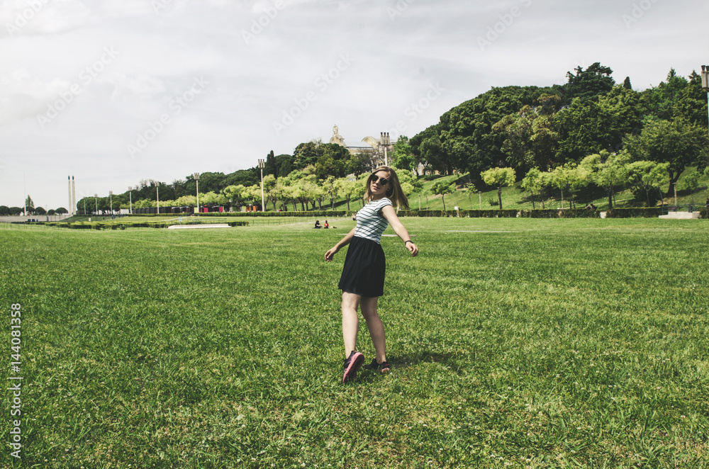 young happy woman running and having fun on grass young happy woman running and having fun on grass