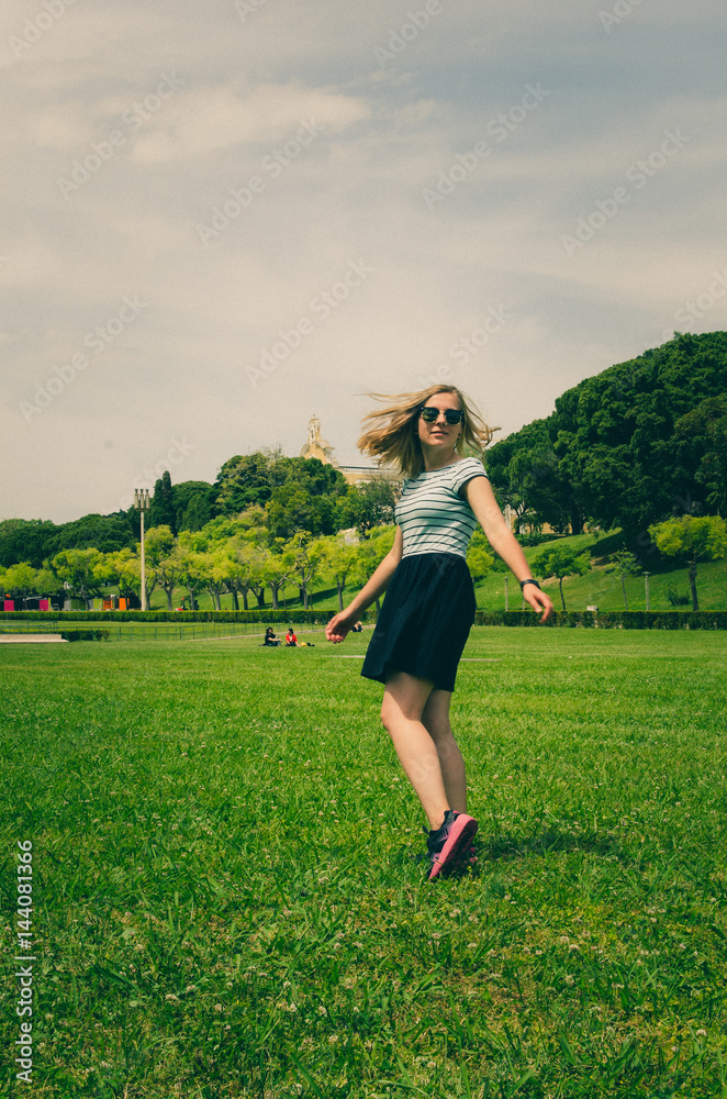 young happy woman running and having fun on grass young happy woman running and having fun on grass