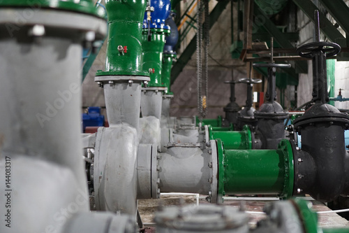 Row of valves in sewer pumping station