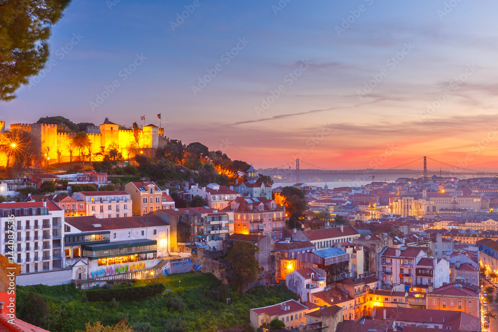The Castle of Sao Jorge, the historical centre of Lisbon, Tagus River and 25 de Abril Bridge at scenic sunset, Lisbon, Portugal