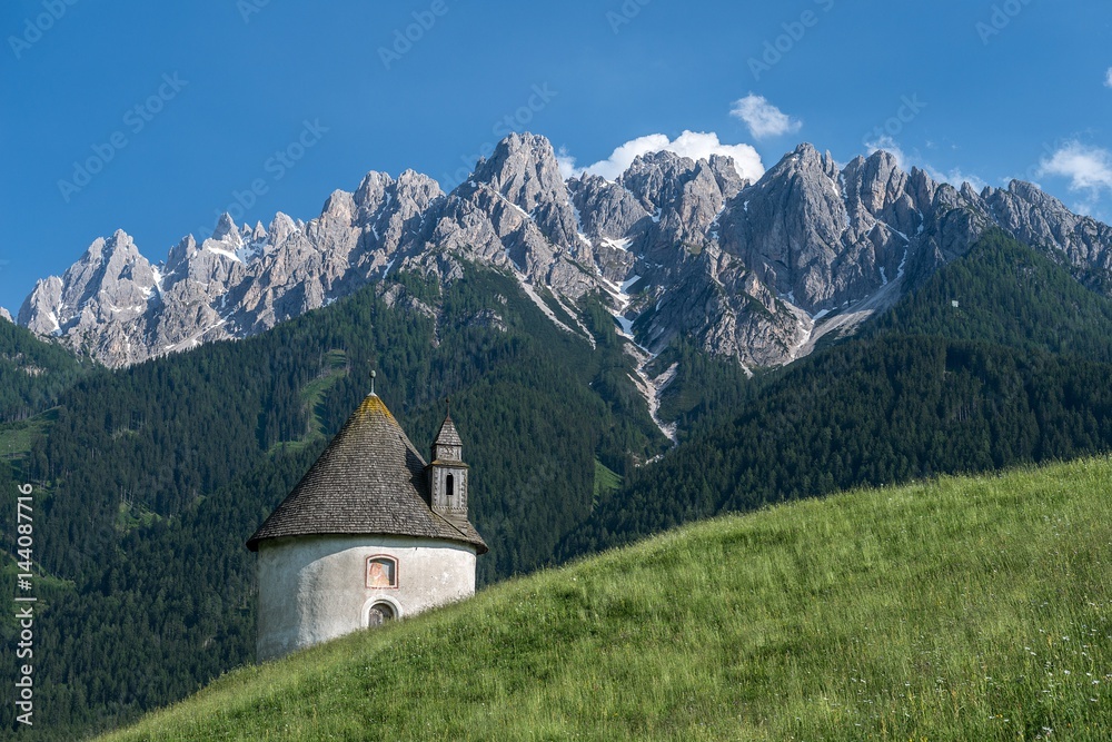 Chapel of Lerschach against rocky mountain Chapel of Lerschach against rocky mountain