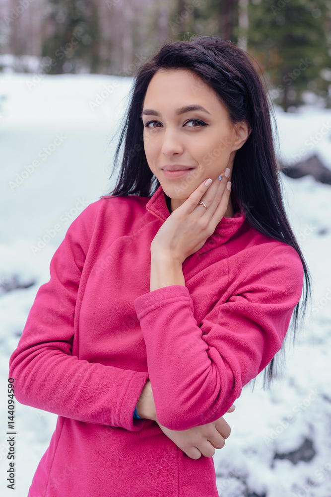 Winter portrait of young beautiful woman
