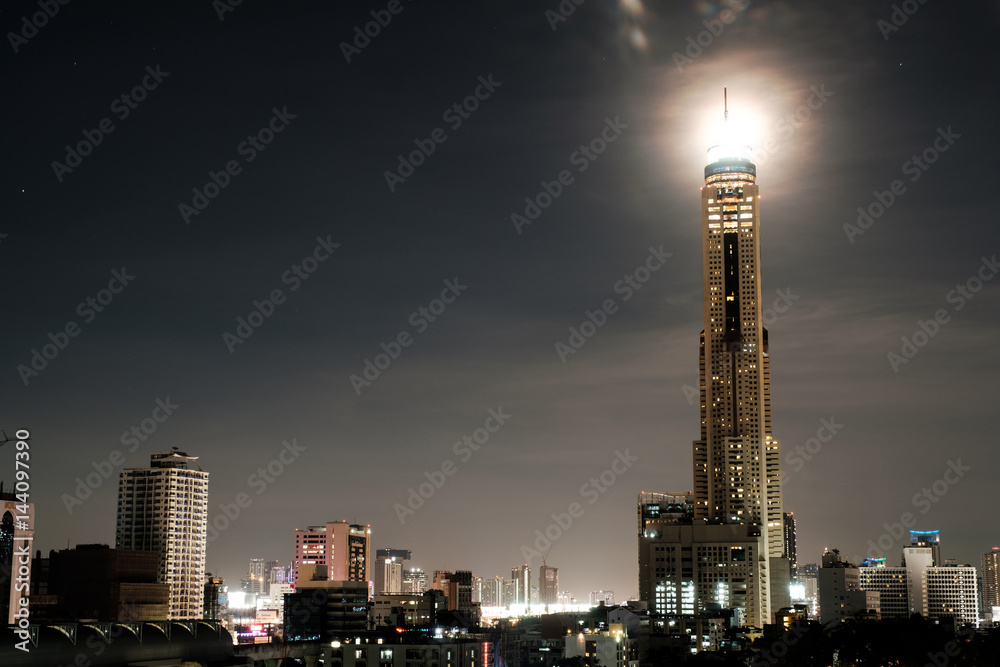 The moon Behind Baiyoke Tower II is an 88-storey, 309 m skyscraper hotel at 222 Ratchaprarop Road in the Ratchathewi district of Bangkok, Thailand