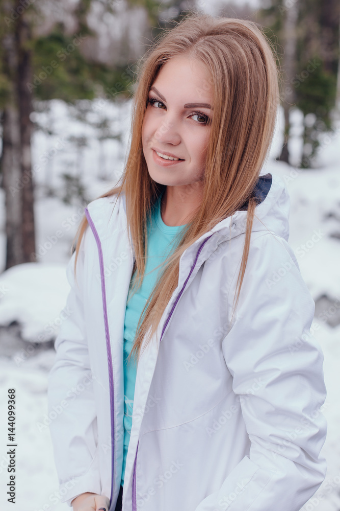 Winter portrait of young beautiful woman