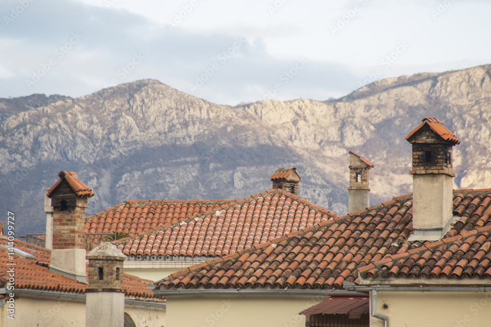 Chimneys on the roofs in Budva
