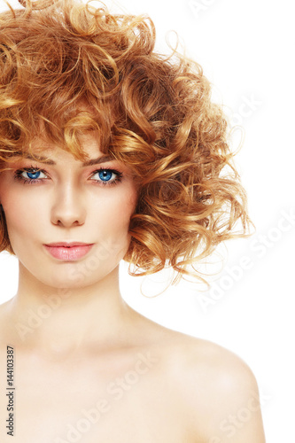 Young beautiful healthy woman with curly hair over white background, copy space