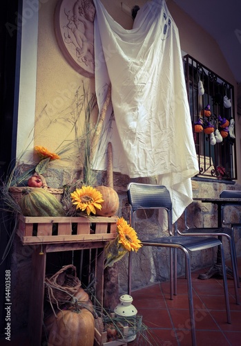 Garlands Halloween in a small cafe in a village in Tuscany, in the Apuan Alps. photo