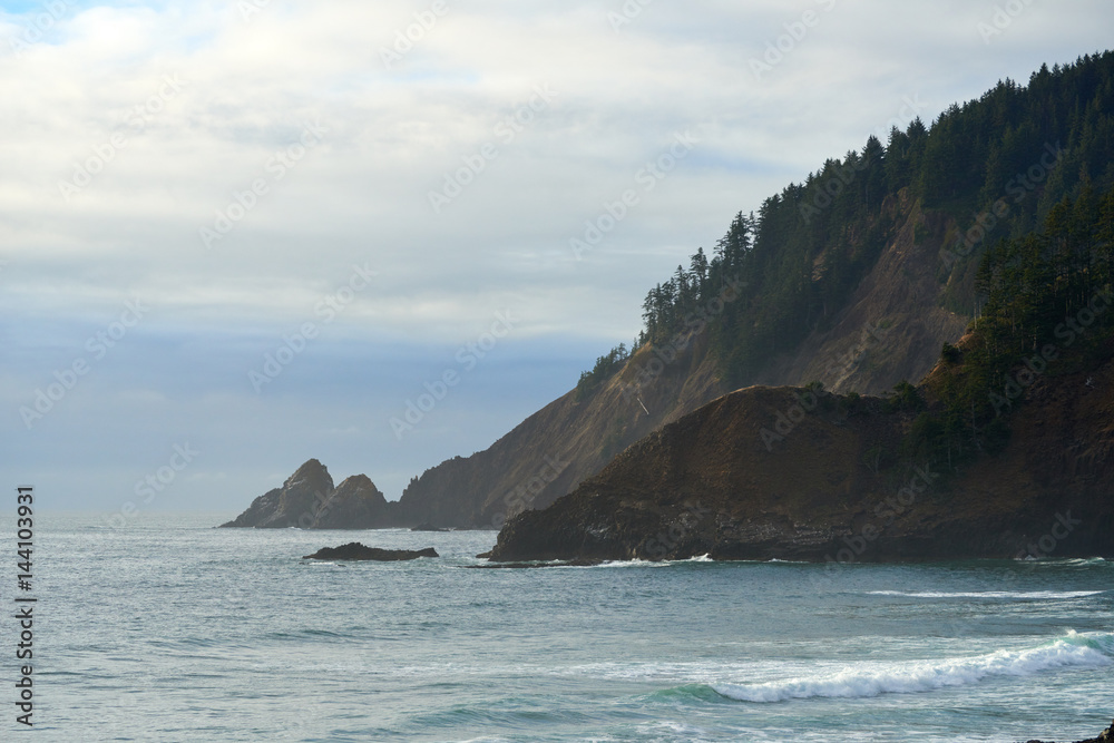 Oregon ocean coast at sunset. View from the Indian Beach in Ecola State Park. USA Pacific Northwest.