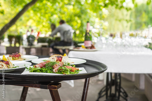 Plates with vegetable mix, food snacks on an event party, wedding, birthday or dinner