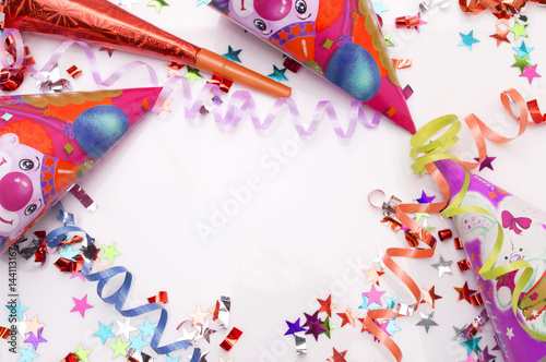 Greeting card for carnival party. hat and candles on white background.