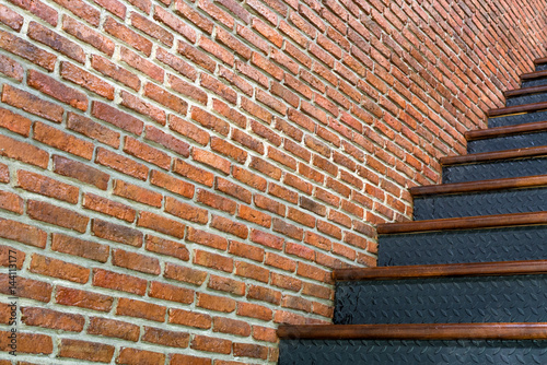red brick wall with iron stair background