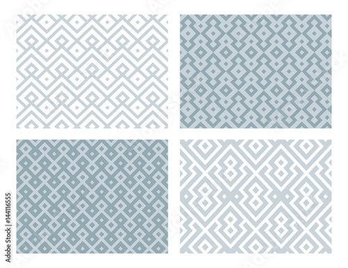 Collection of four geometric seamless patterns. Blue vector background.