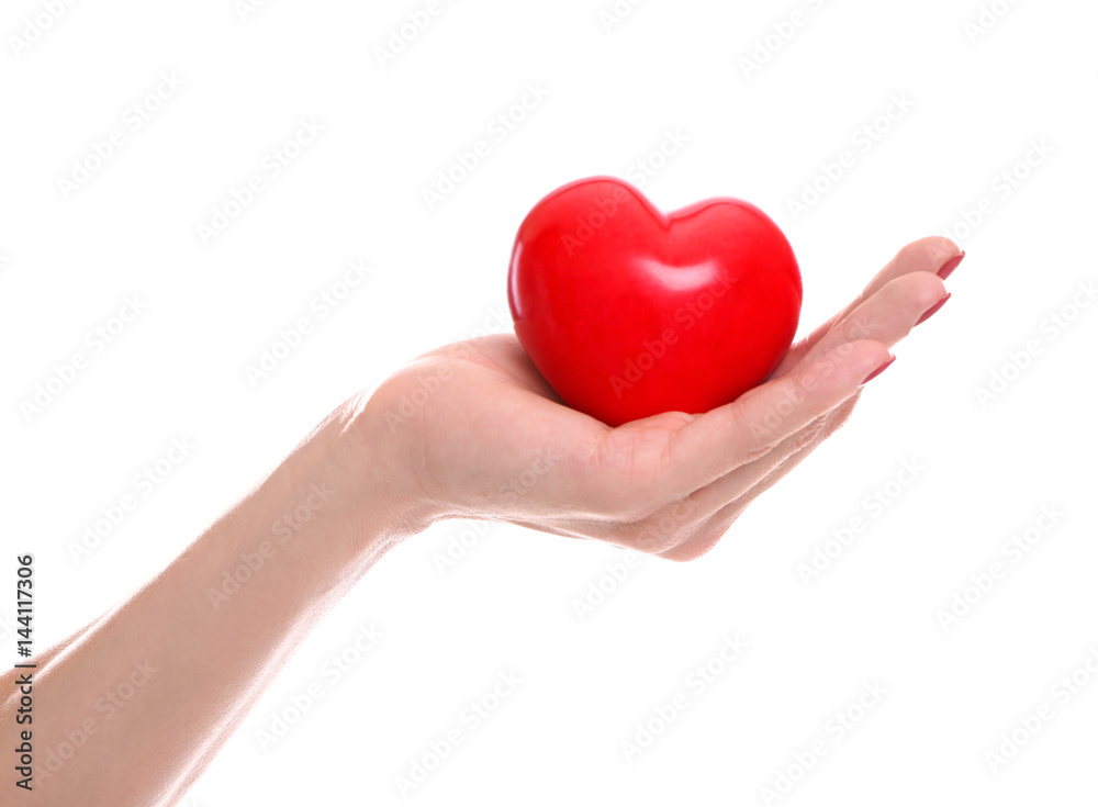 Girl holding red heart on white background