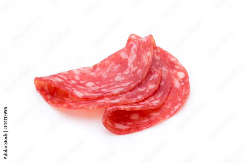 Salami smoked sausage slices isolated on white background cutout. Salami smoked sausage slices isolated on white background cutout.