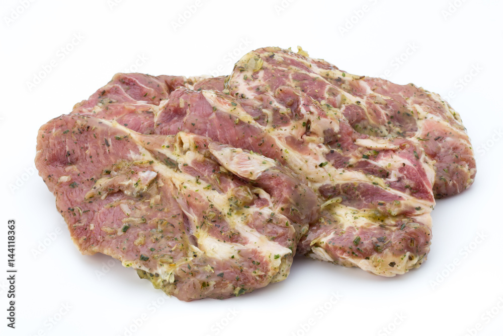 Pork chop, marinated. Isolated on the white background. Pork chop, marinated. Isolated on the white background.