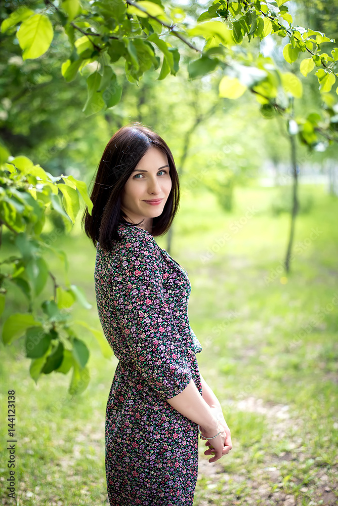 Beautiful girl on background of young foliage Beautiful girl on background of young foliage