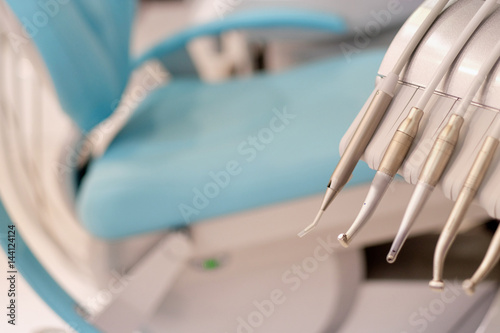 Dental chair and dental drill tips in the clinic
