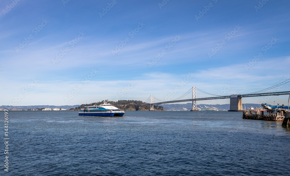 San Francisco Bay Bridge and ferry boat - San Francisco, California, USA